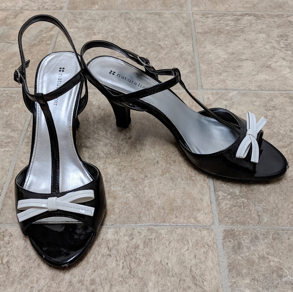 Black with white bow faux patent leather heels